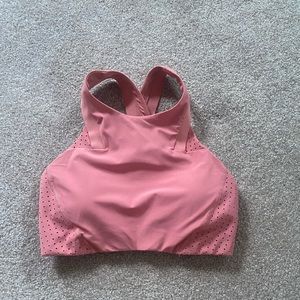 Coral/burnt orange high neck sports bra